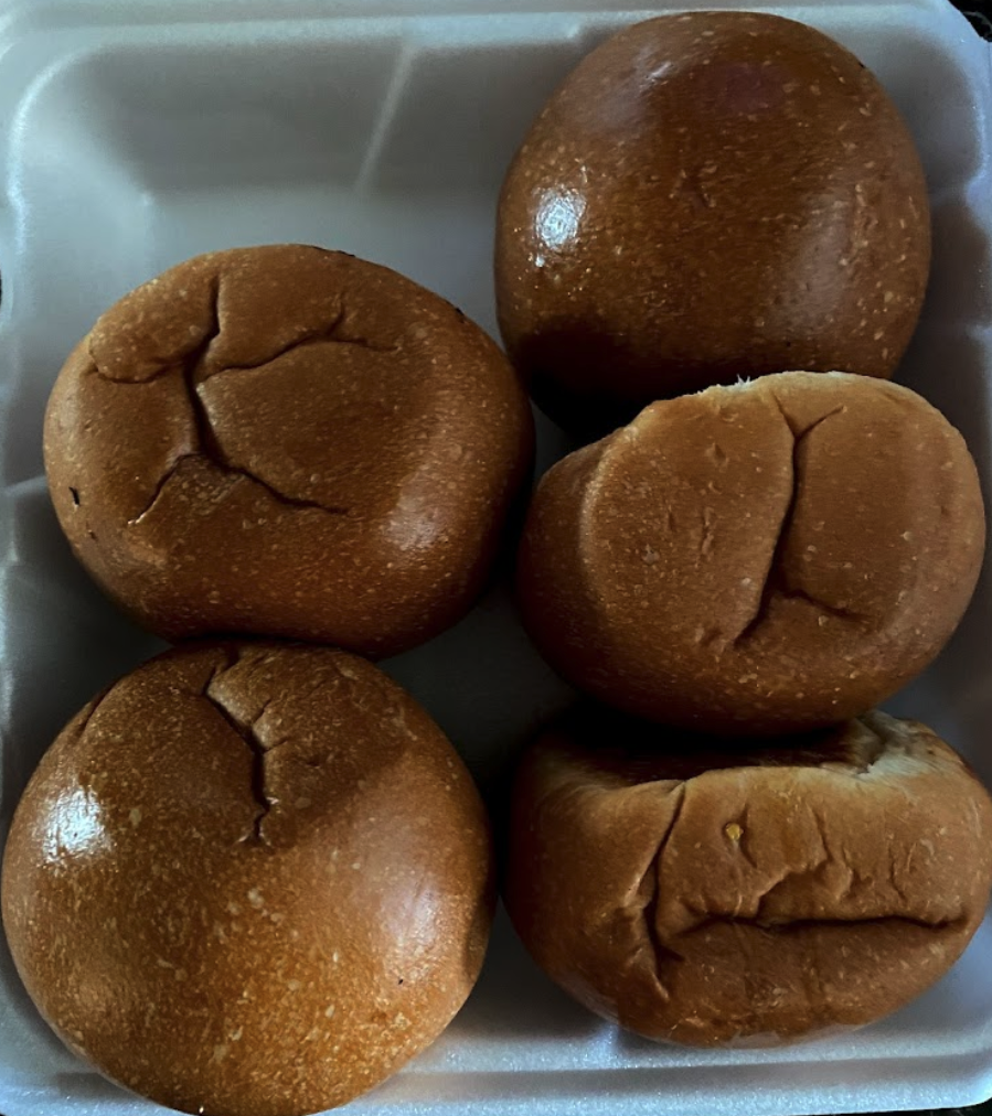 Red bean sesame balls and steamed buns on a plate